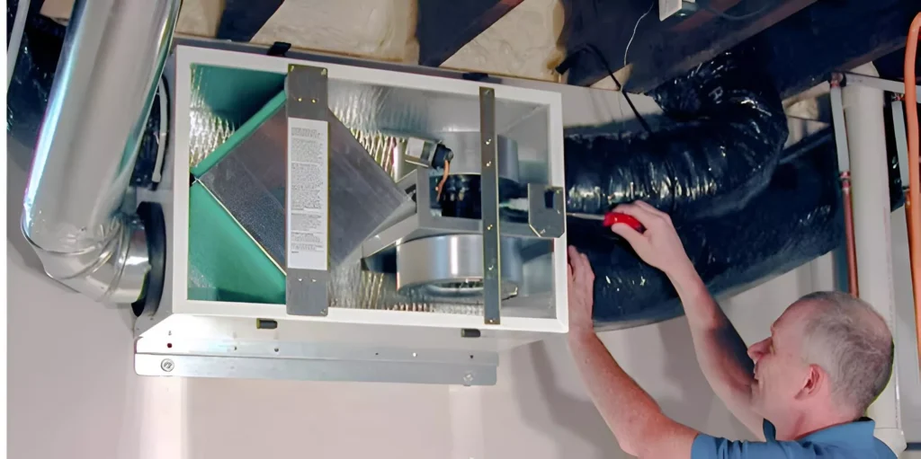 image of a profesional installing a ventilation system | Benefits of Proper Ventilation | Ventit